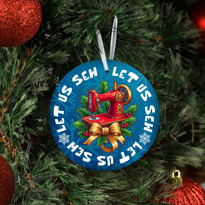 The Let Us Sew ornament displayed on a Christmas tree