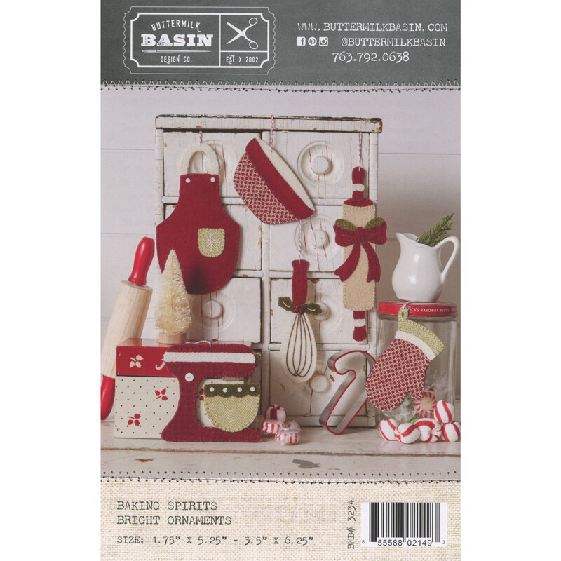 Front of the Baking Spirits Bright Ornament pattern featuring 6 wool ornaments displayed on a table with other kitchen accessories