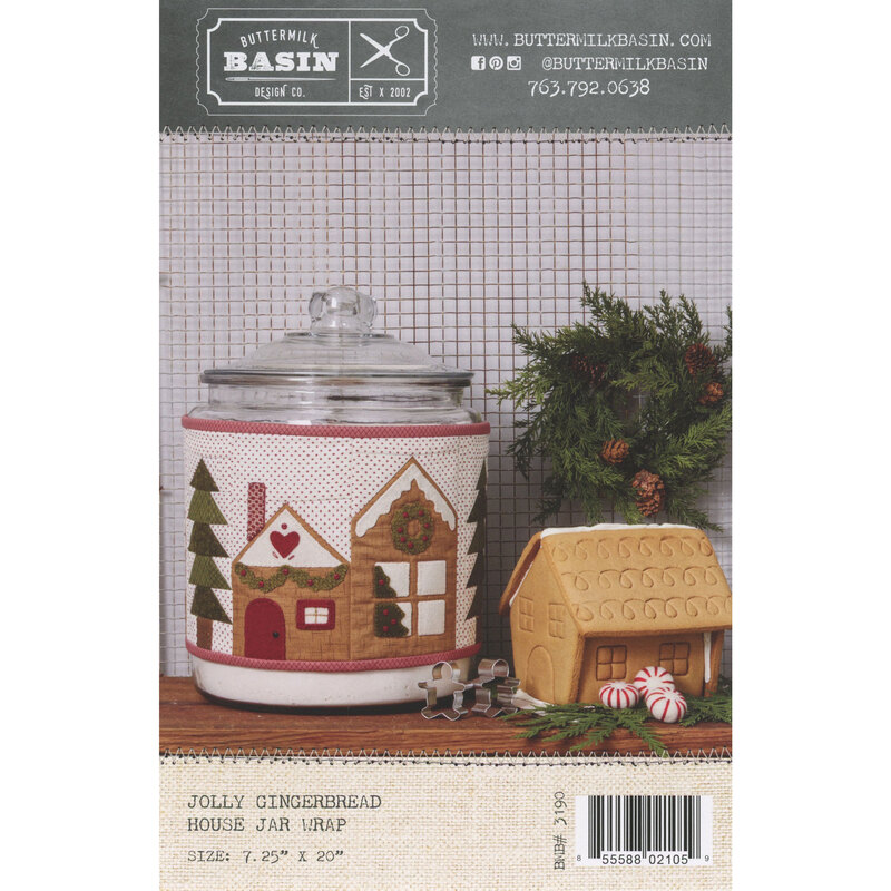 Front of the Jolly Gingerbread House Jar Wrap pattern featuring the wrap displayed on a jar 