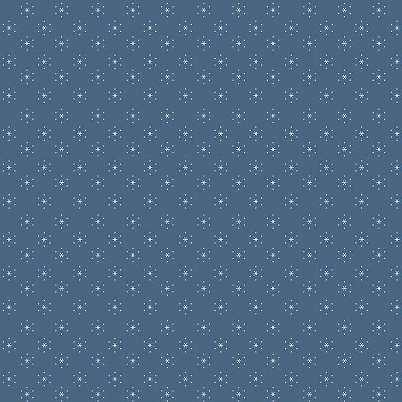 Denim blue fabric with small, white, evenly spaced stars that are surrounded by little white polka dots