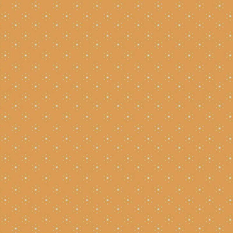 Caramel-colored fabric with small, white, evenly spaced stars that are surrounded by little white polka dots