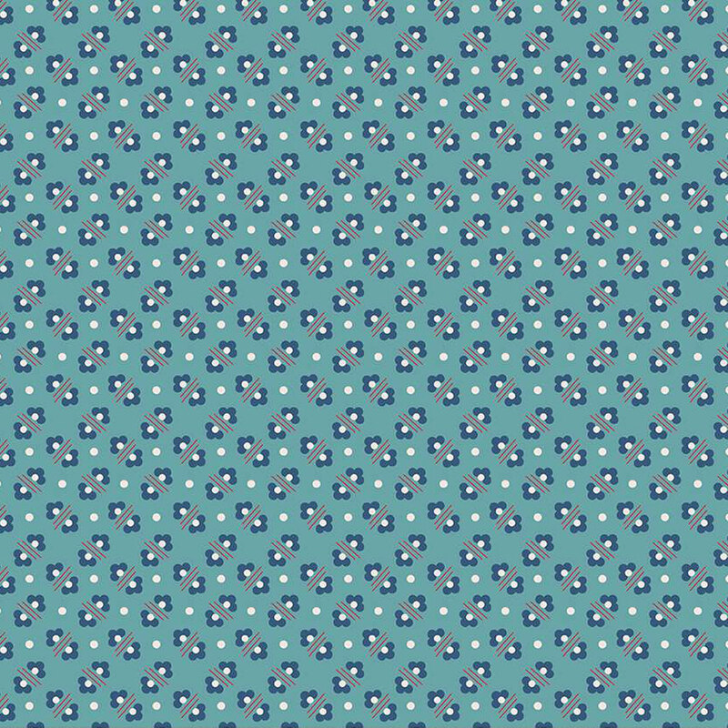 Teal fabric featuring little navy blue flowers arranged in alternating patterns and small white polka dots