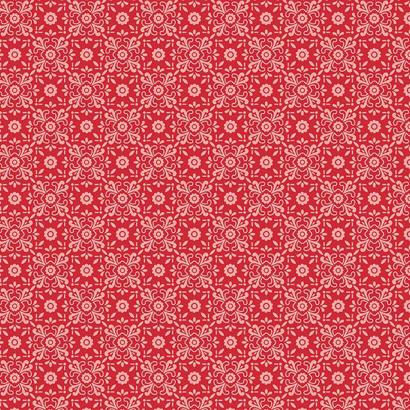 Barn red fabric with tonal, ornamental floral shapes making a lattice pattern throughout