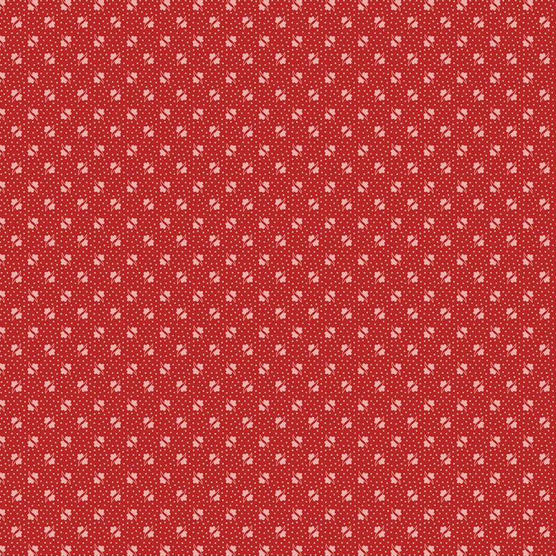 Barn red fabric with small, tonal, alternating floral shapes and light red pin dots all over