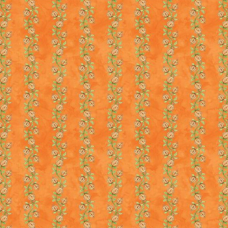 Mottled orange fabric with a striped pumpkin pattern 