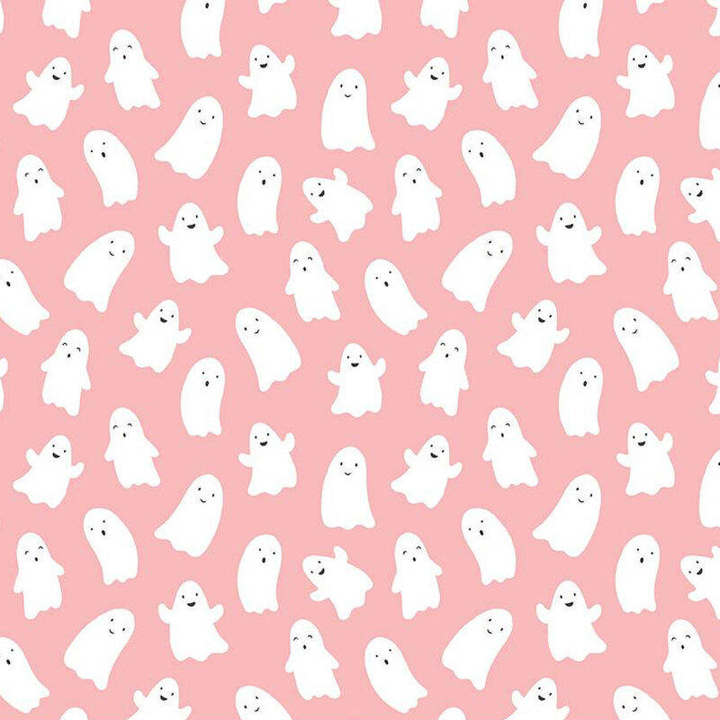 Pink fabric with smiling blobby ghosts.