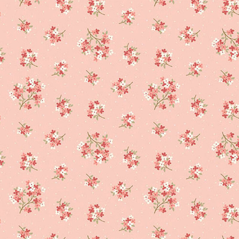 Light pink fabric featuring a pattern of floral clusters