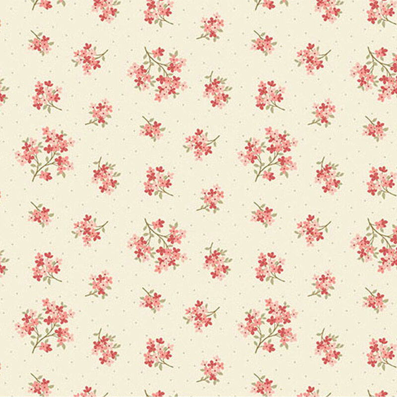 Cream fabric featuring a pattern of floral clusters