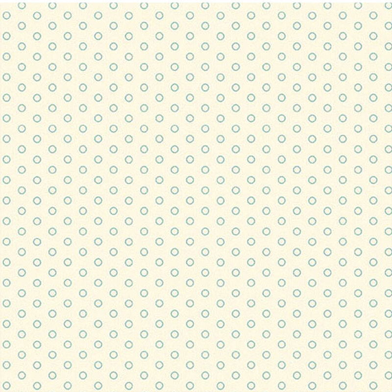 Cream fabric featuring aqua polka dots