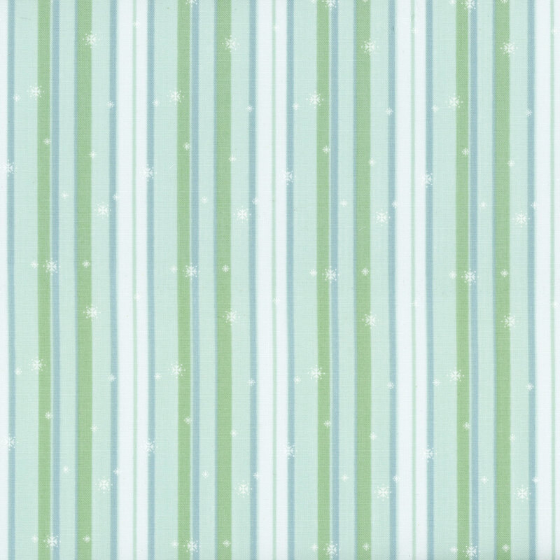 White, green, blue, and aqua striped fabric with small snowflakes falling down the print.