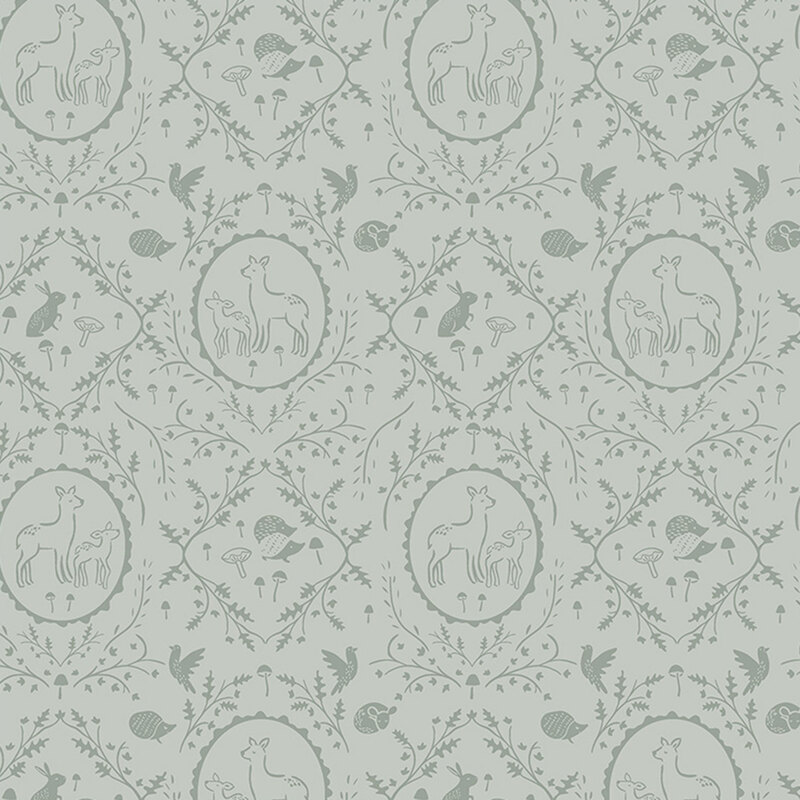 Sage gray fabric with tonal leaves and vines in a damask pattern surrounding forest animals.