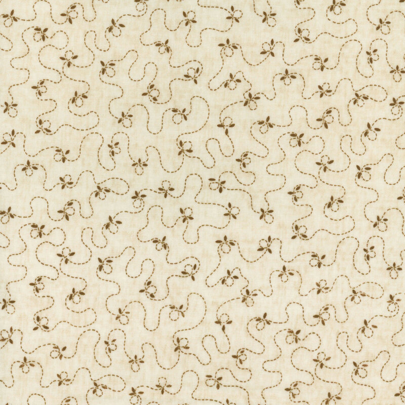 Very light cream fabric with a dotted vine and calico leaf print.