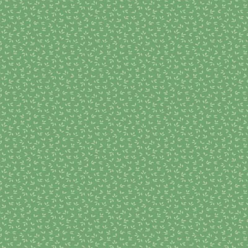 A tonal Green fabric with a flower petal pattern