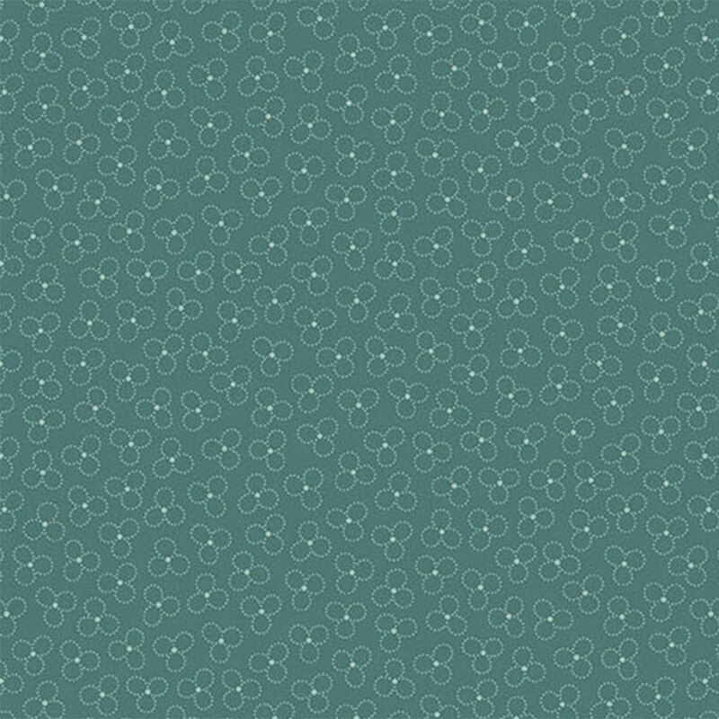 Teal fabric with a trefoil pattern