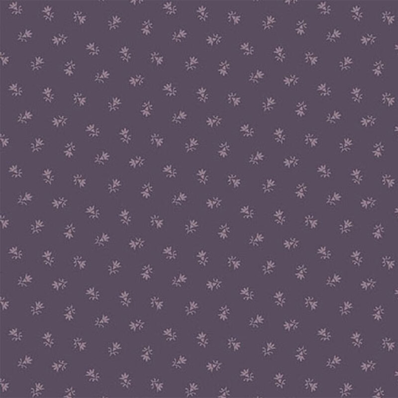 A fabric pattern featuring small, scattered floral designs on a dark purple background.