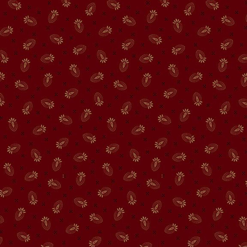 Red fabric with a repeated pattern of beige floral and leaf shapes.