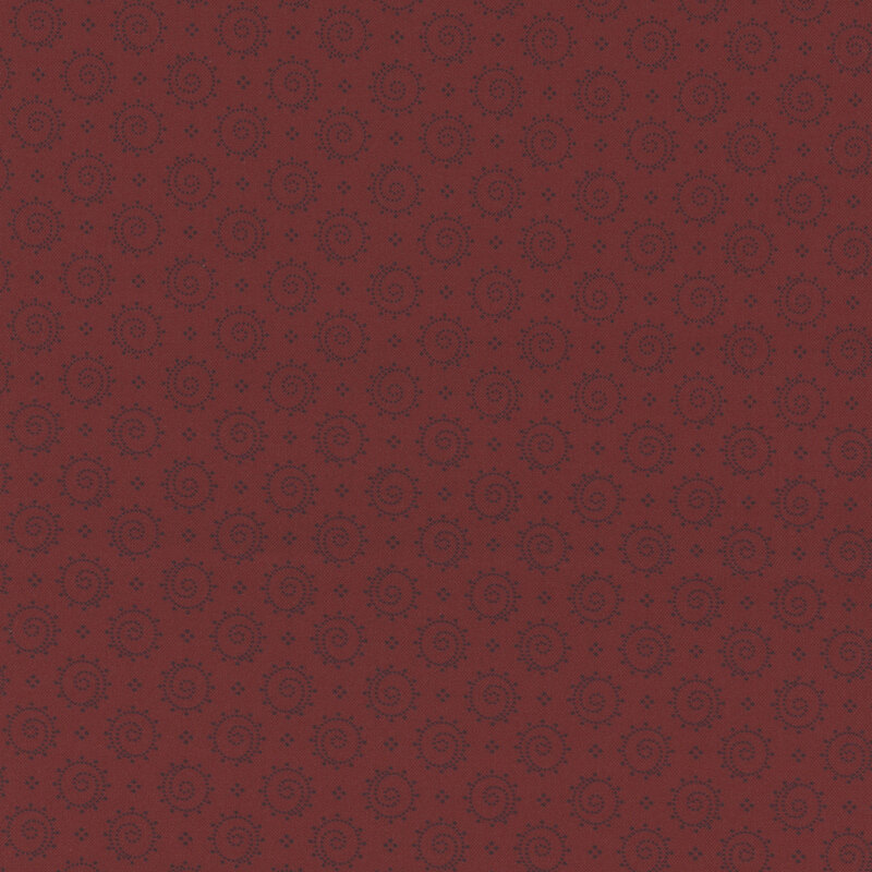 Dark red fabric featuring a repeating pattern of circular motifs.