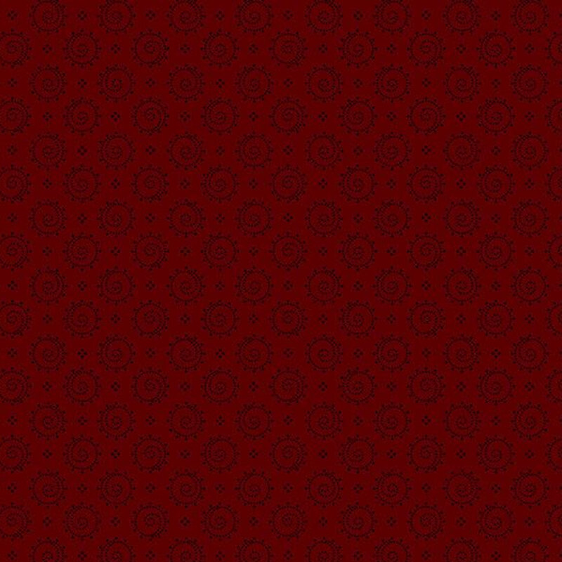 Dark red fabric featuring a repeating pattern of circular motifs.