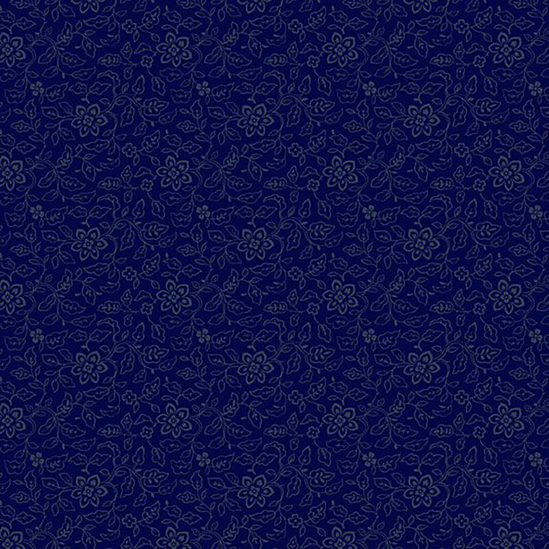 Tonal blue patterned fabric featuring small floral and leaf designs.