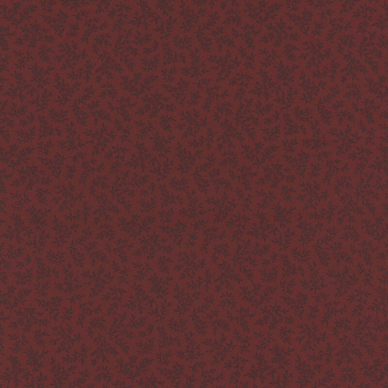 Dark red fabric scattered with black sprigs