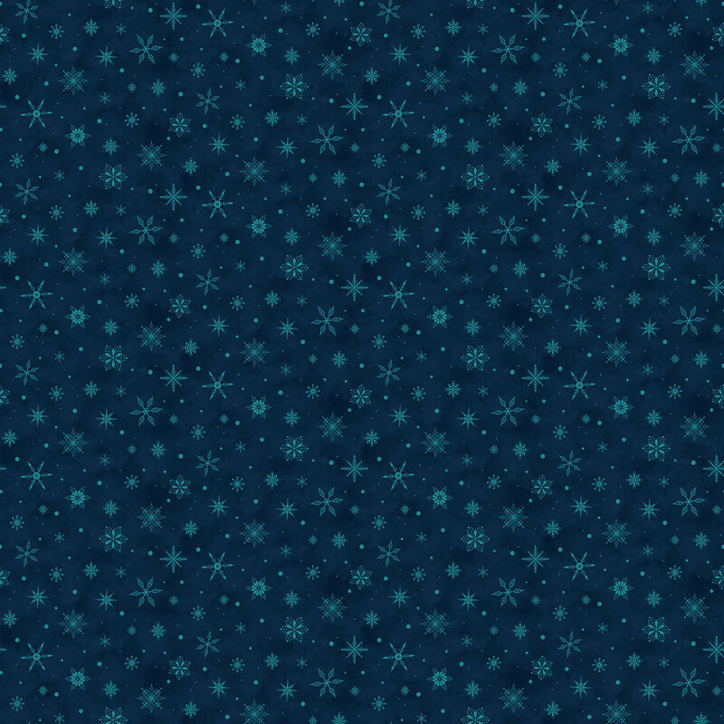 Navy fabric with small scattered aqua snowflakes.