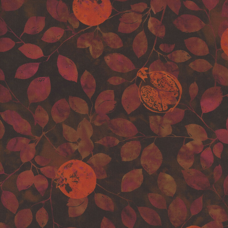 Dark green fabric featuring orange leaves and pomegranates.