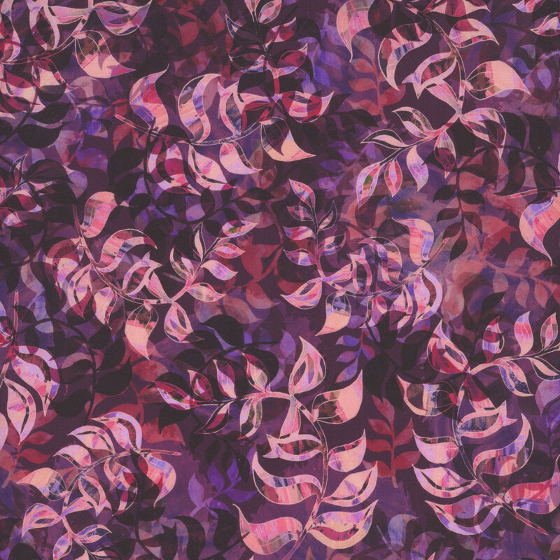 Fabric with colorful leaves in overlapping abstract patterns on a dark plum background.