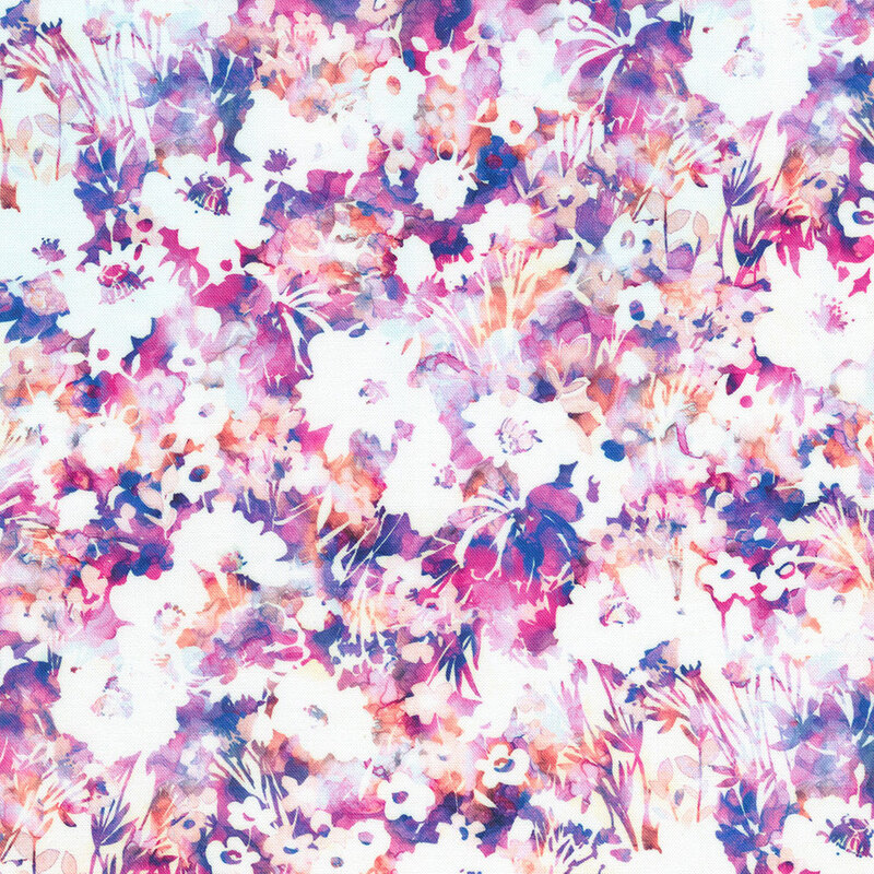 Fabric with a vibrant floral pattern featuring magenta, indigo, and white flowers on a bright purple background.