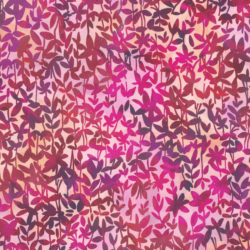 Fabric with a vibrant fuchsia background filled with overlapping leafy patterns in various shades of plum and pink.