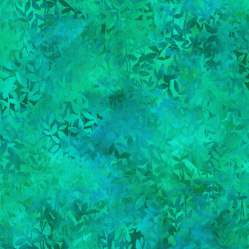 Fabric with a vibrant teal background filled with overlapping leafy patterns in various shades of green and blue.