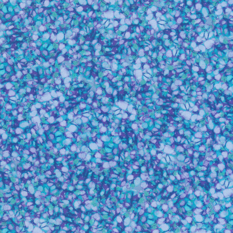 Fabric with an abstract pattern of lilac and blue flower petals with a speckled texture.