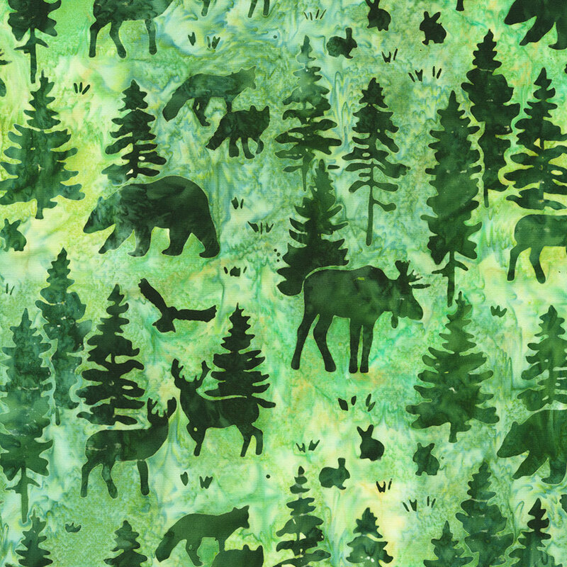 Pattern of dark silhouettes of animals and trees on a vibrant green, watercolor-style background.