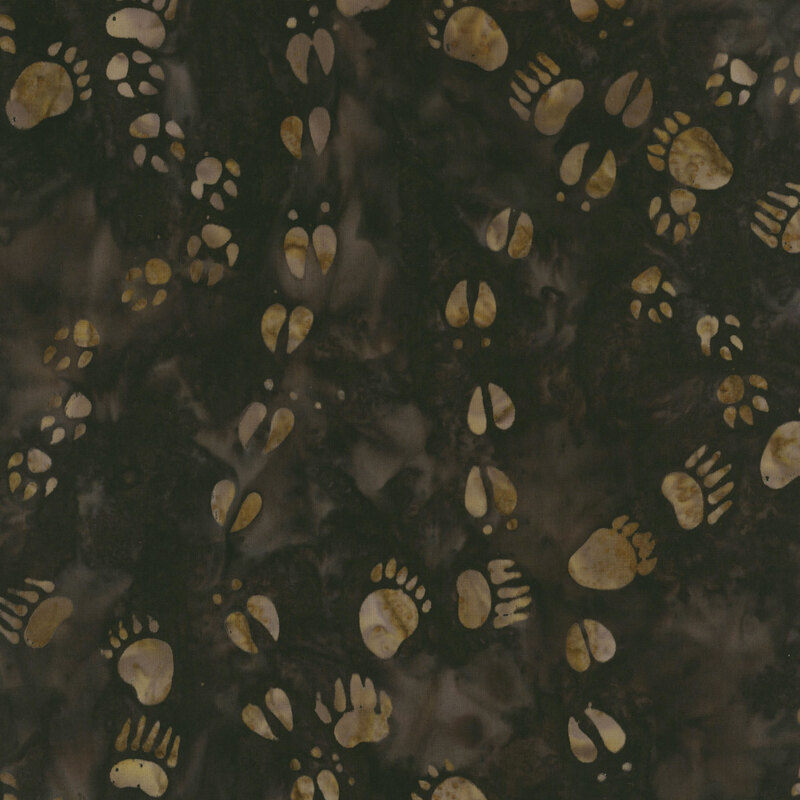 A dark green background filled with various animal paw prints in lighter gold tones.