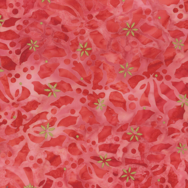 Mottled light red fabric featuring a holly leaf design with gold metallic accents.