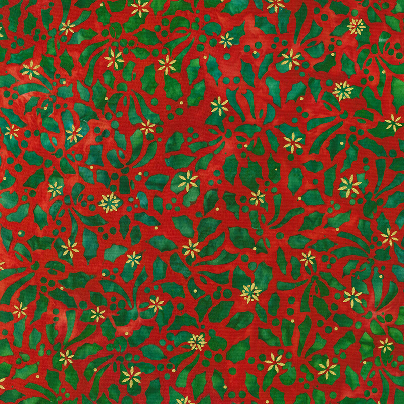 Red and green fabric featuring a holly leaf design with small gold metallic accents