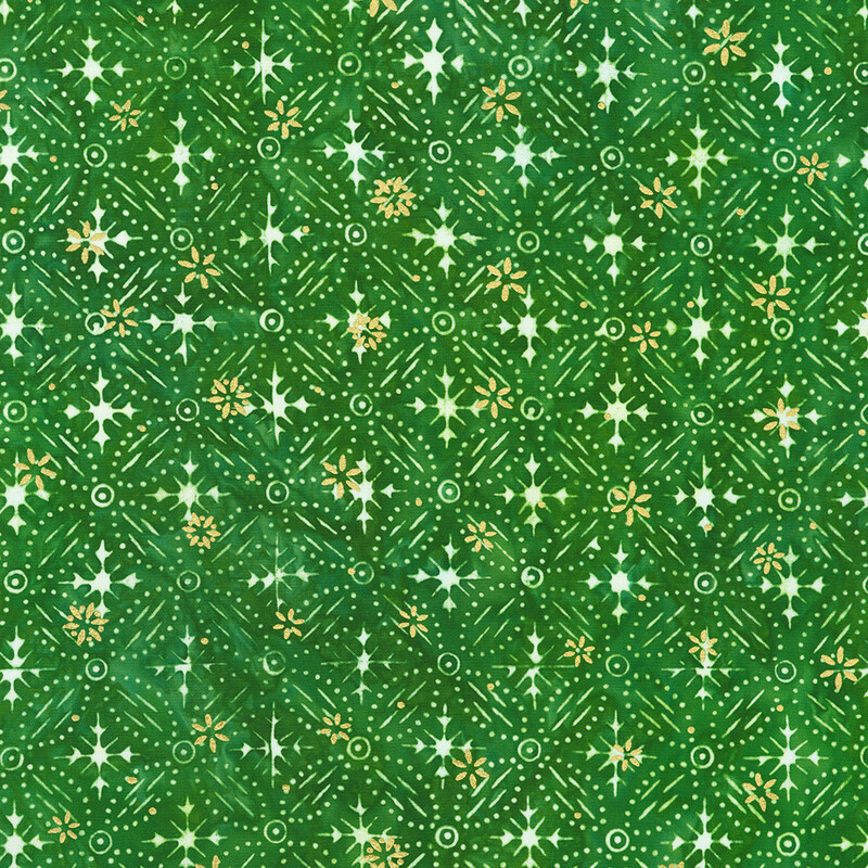 Green mottled fabric featuring a pattern of white snowflake designs with gold metallic accents