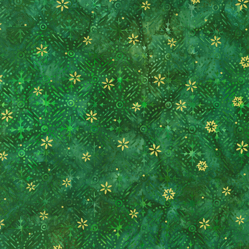 Green mottled fabric featuring a pattern of green snowflake designs with gold metallic accents