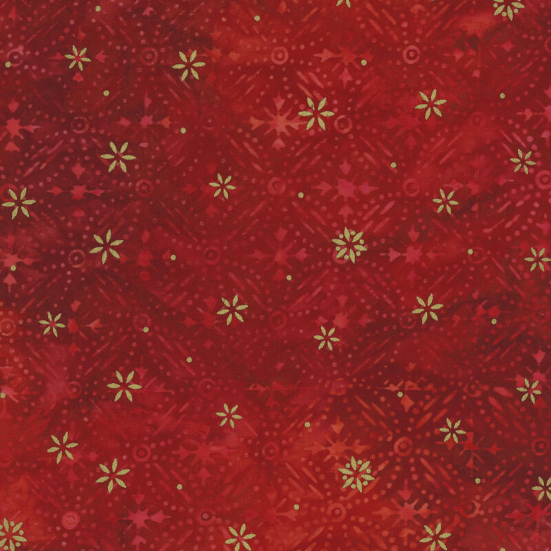 Red mottled fabric featuring a pattern of snowflake designs with gold metallic accents