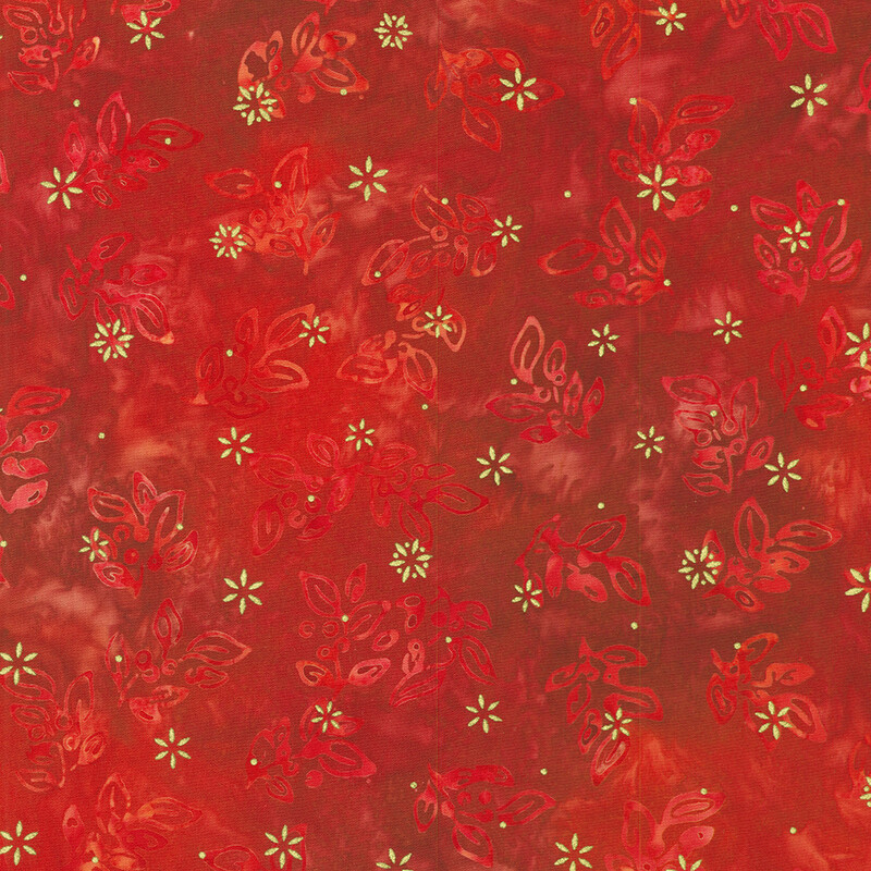 Red mottled background with a delicate holly leaf design with gold metallic accents