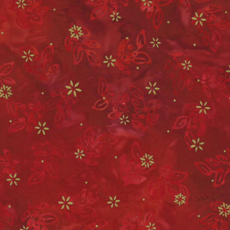 Red mottled background with a delicate holly leaf design with gold metallic accents