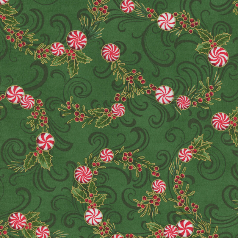 Pattern of red and white peppermint swirls surrounded by holly leaves on a green background.