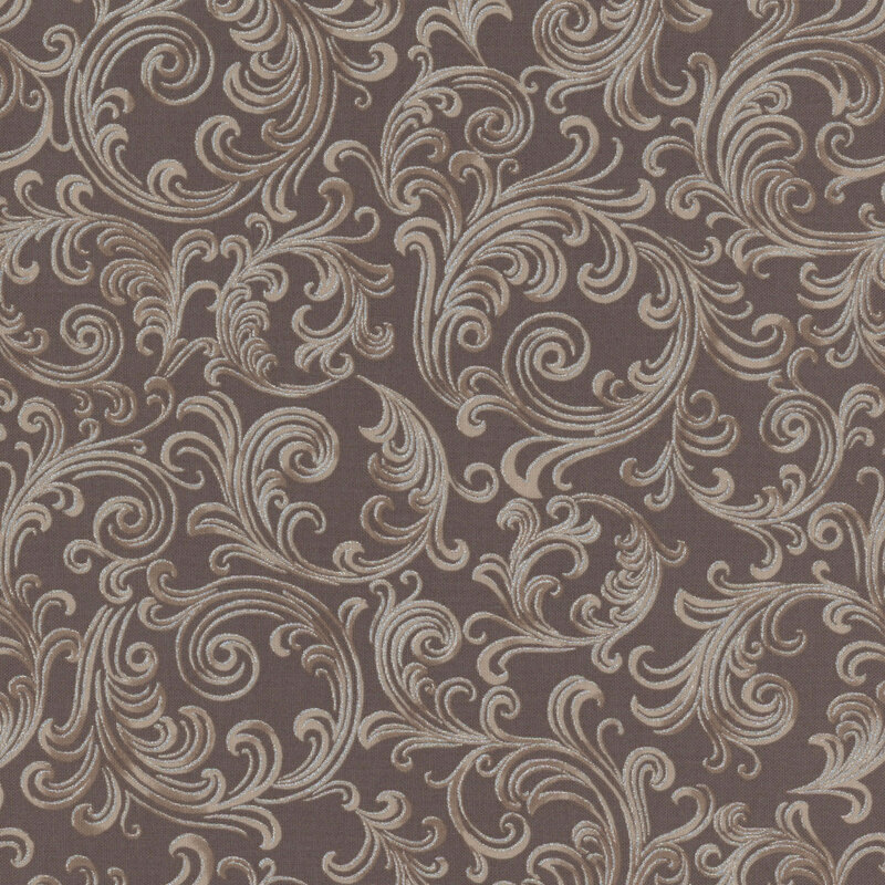 Intricate tan fabric, featuring swirling designs.