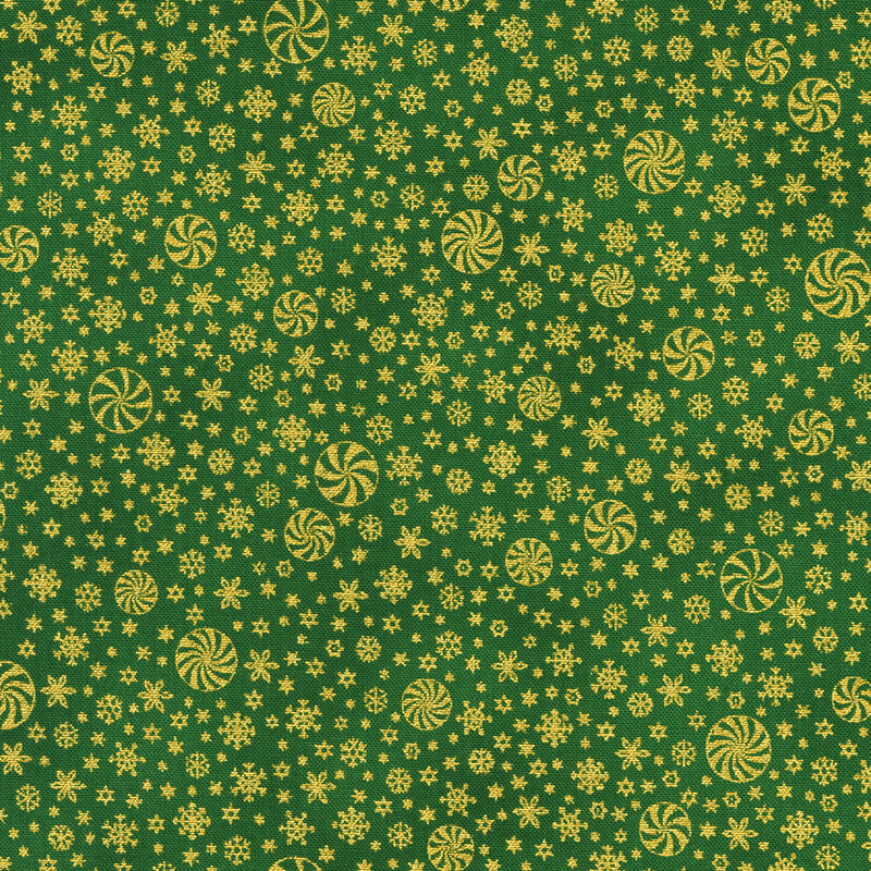 A green fabric covered in golden peppermints and snowflakes.