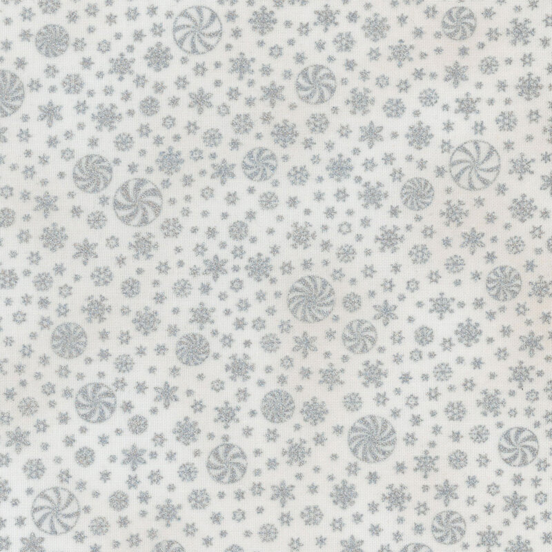 White fabric featuring various snowflake and candy designs.