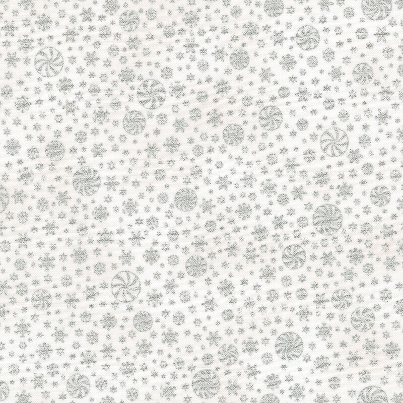 White fabric featuring various snowflake and candy designs.