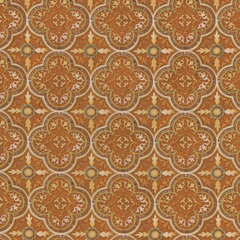 Geometric fabric pattern featuring golden, orange, and green leaves in a repeating design.