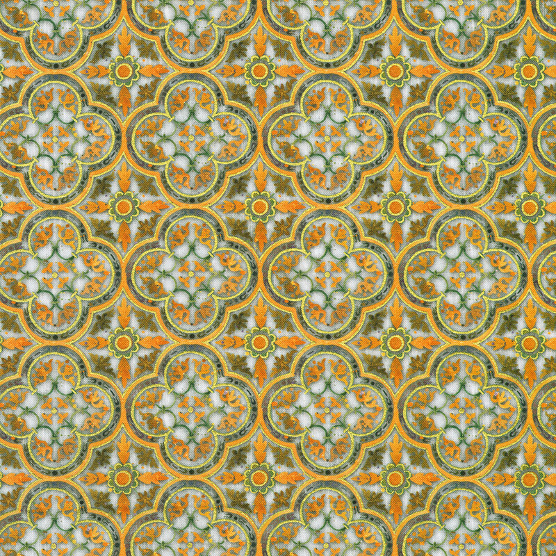 White fabric with a orange and green geometric leaf pattern 