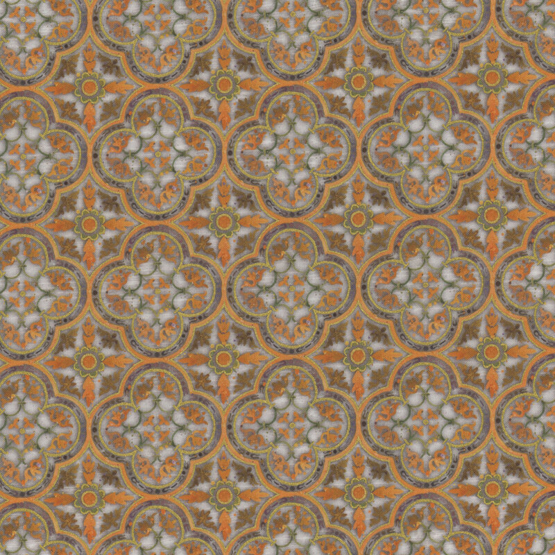 White fabric with a orange and green geometric leaf pattern 