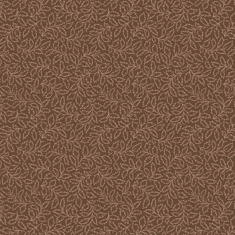 Brown patterned fabric with intricate light brown leaves and swirls. 