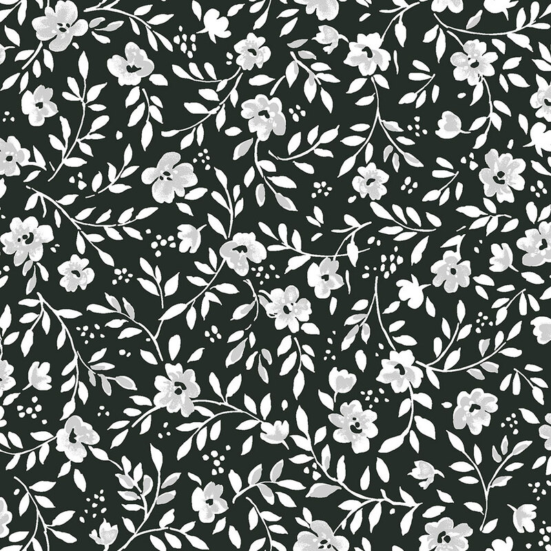 A dark green background covered with delicate white floral and leaf patterns, creating a soft, elegant design.